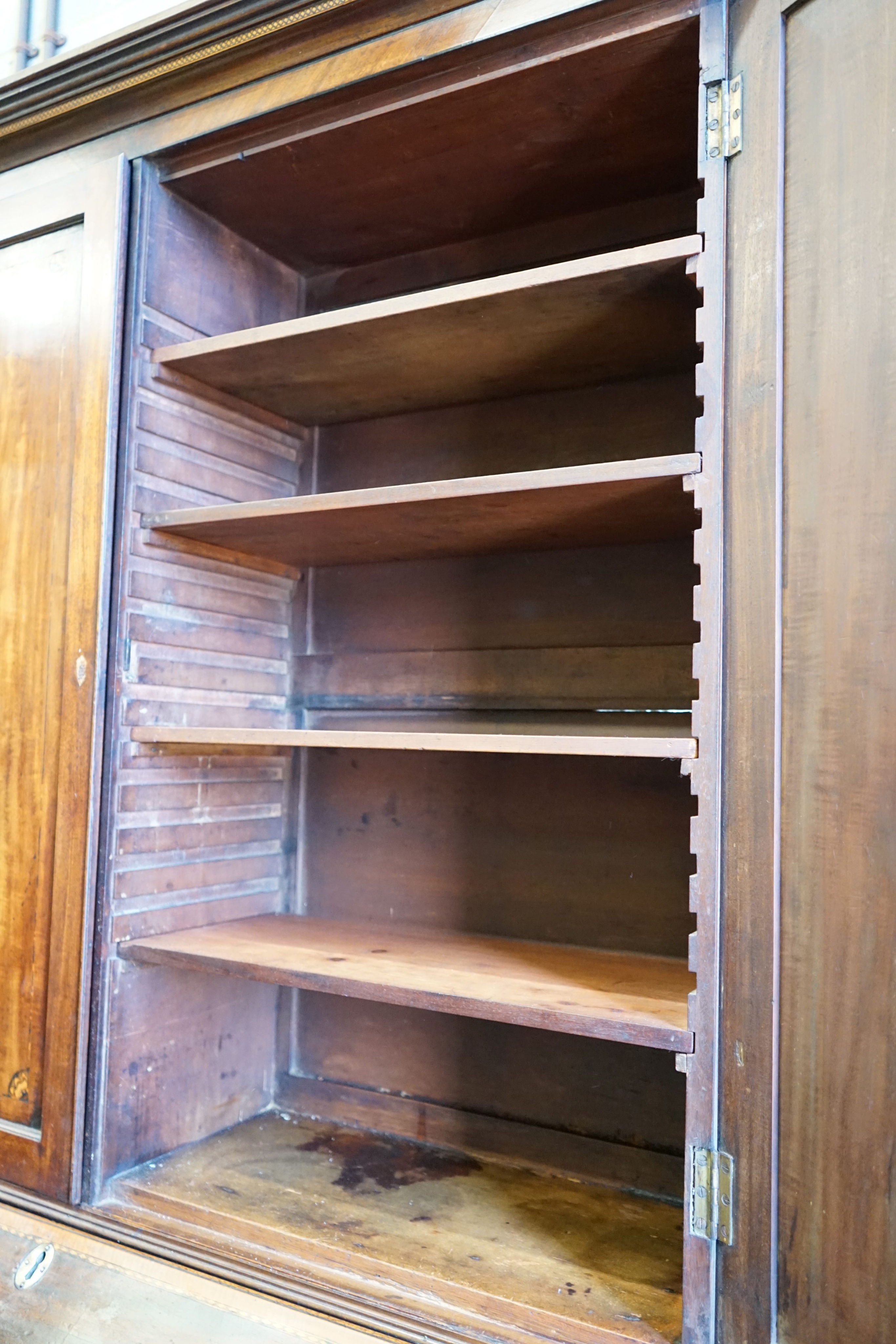 A George III inlaid mahogany bureau bookcase, width 120cm, depth 56cm, height 224cm